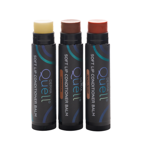 Three lip balm tubes with lids removed, one white balm labeled