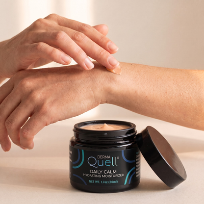 Person applying DermaQuell Daily Calm Hydrating Moisturizer to their wrist