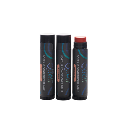 Three lip balm tubes with DermaQuell Soft Lip Conditioner Balm Peach Peony branding with cap removed on one tube revealing a pink toned lip balm
