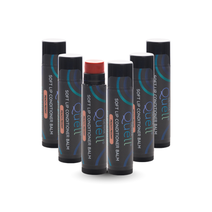 Six lip balm tubes with DermaQuell Soft Lip Conditioner Balm Peach Peony branding with cap removed on one tube revealing a pink toned lip balm
