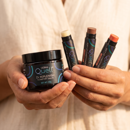 Hands presenting Z+ Replenish Comfort Salve with three Soft Lip Conditioner Balms.
